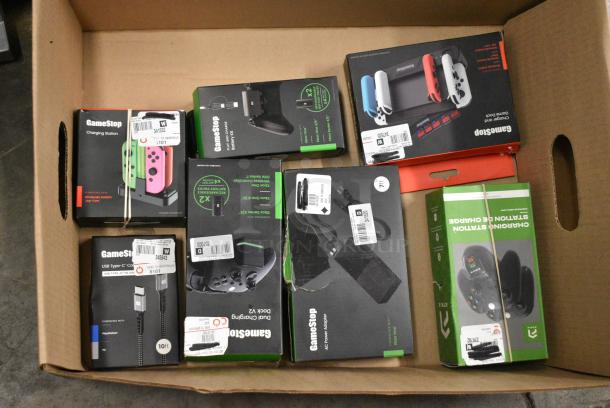 ALL ONE MONEY! Lot of IN ORIGINAL BOX! Items Including Nintendo Joycons, GameStop Dual Charging Dock, GameStop Nintendo Switch Steering Wheel, Nintendo Switch Charger and Game Deck. - Image 4 of 6