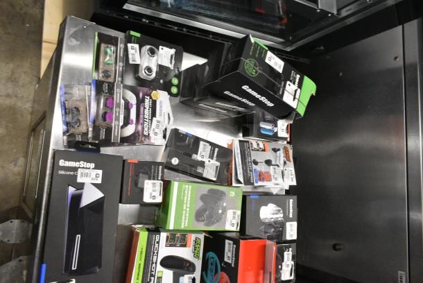 ALL ONE MONEY! Lot of IN ORIGINAL BOX! Items Including Nintendo Joycons, GameStop Dual Charging Dock, GameStop Nintendo Switch Steering Wheel, Nintendo Switch Charger and Game Deck. - Image 6 of 6