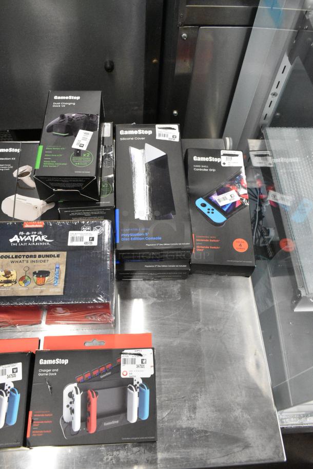 ALL ONE MONEY! Lot of IN ORIGINAL BOX! Items Including Nintendo Switch Charger / Game Docks, Nintendo Switch Controller Grip Kit, VP Protection Kit, PlayStation 5 Disc Edition Console Silicone Cover - Image 4 of 5