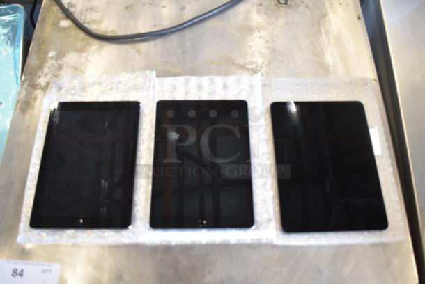 3 Tablets Including Apple iPad A1980, Apple iPad A1893, Apple iPad 1475. 3 Times Your Bid! - Image 1 of 10