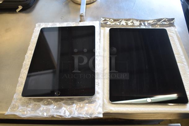 2 Tablets Including Apple A1701 iPad and Apple A1893 iPad . 2 Times Your Bid! - Image 1 of 5