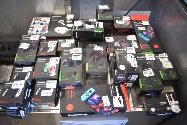 ALL ONE MONEY! Lot of IN ORIGINAL BOX! Items Including Nintendo Switch Docks, VR Protection Kit, Nintendo Switch Controller Grip. - Image 1 of 12