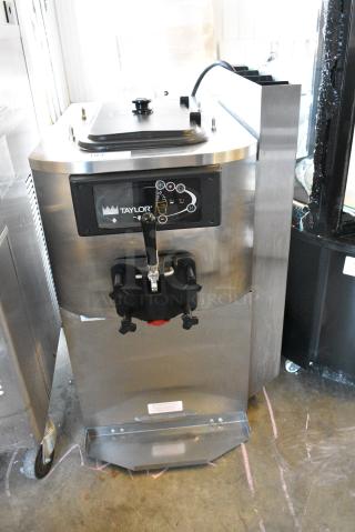 2019 Taylor C709-27 Stainless Steel Commercial Countertop Air Cooled Single Flavor Soft Serve Ice Cream Machine. 208-230 Volts, 1 Phase.