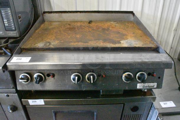Garland Stainless Steel Commercial Countertop Natural Gas Powered Flat Top Griddle. - Image 1 of 5