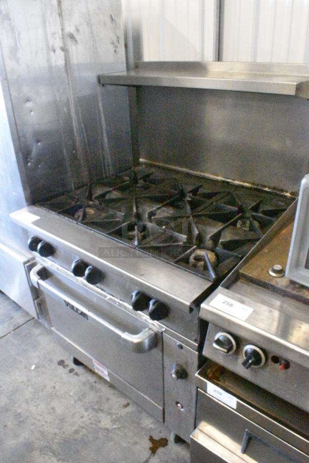 Vulcan 36S-Y1A Stainless Steel Commercial Natural Gas Powered 6 Burner Range w/ Oven, Over Shelf and Back Splash on Commercial Casters. - Image 3 of 8