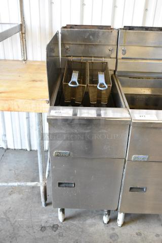 Pitco Frialator SG14 Stainless Steel Commercial Floor Style Natural Gas Powered Deep Fat Fryer w/ Side Splash Guard and 2 Metal Fry Baskets. 110,000 BTU.