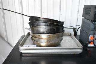 11 Various Metal Items Including Skillets and Baking Pans. 11 Times Your Bid!