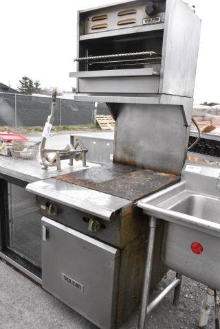 Vulcan Stainless Steel Commercial Natural Gas Powered Flat Top Griddle, Salamander Cheese Melter on Commercial Casters.