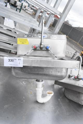 Stainless Steel Single Bay Wall Mount Sink w/ Faucet and Handles.