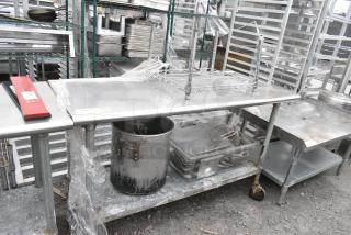 Stainless Steel Table w/ Contents and Under Shelf on Commercial Casters.