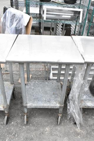 Stainless Steel Table w/ Contents and Under Shelf on Commercial Casters.