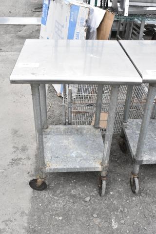 Stainless Steel Table w/ Contents and Under Shelf on Commercial Casters.