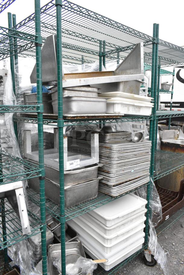 Green Finish 4 Tier Wire Shelving Unit on Commercial Casters w/ Contents Including Metal Baking Pans, Poly Dough Bins and Shelf. BUYER MUST DISMANTLE. PCI CANNOT DISMANTLE FOR SHIPPING. PLEASE CONSIDER FREIGHT CHARGES. - Image 1 of 11
