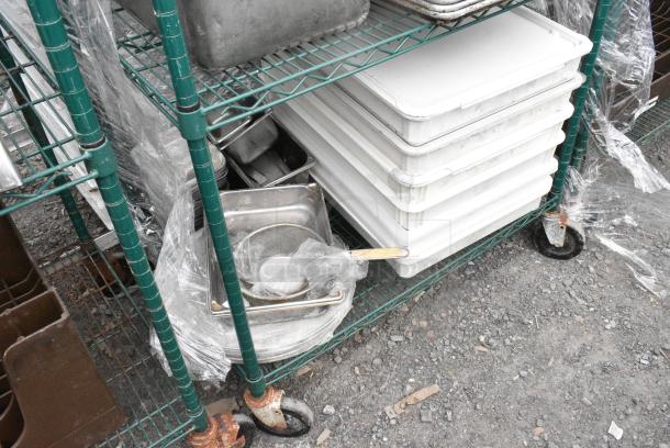 Green Finish 4 Tier Wire Shelving Unit on Commercial Casters w/ Contents Including Metal Baking Pans, Poly Dough Bins and Shelf. BUYER MUST DISMANTLE. PCI CANNOT DISMANTLE FOR SHIPPING. PLEASE CONSIDER FREIGHT CHARGES. - Image 5 of 11
