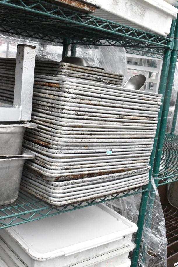 Green Finish 4 Tier Wire Shelving Unit on Commercial Casters w/ Contents Including Metal Baking Pans, Poly Dough Bins and Shelf. BUYER MUST DISMANTLE. PCI CANNOT DISMANTLE FOR SHIPPING. PLEASE CONSIDER FREIGHT CHARGES. - Image 9 of 11