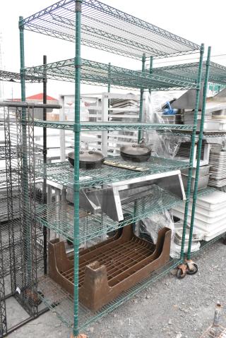 Green Finish 6 Tier Wire Shelving Unit on Commercial Casters w/ Contents Including Poly Dunnage Rack and Shelf. BUYER MUST DISMANTLE. PCI CANNOT DISMANTLE FOR SHIPPING. PLEASE CONSIDER FREIGHT CHARGES.