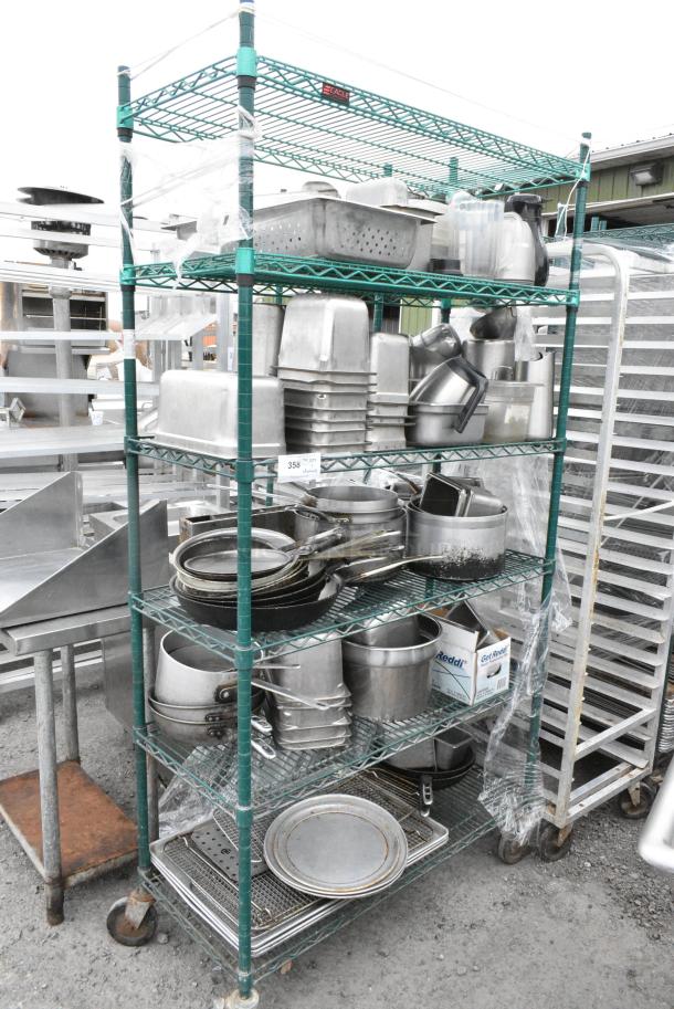 Green Finish 6 Tier Wire Shelving Unit on Commercial Casters w/ Contents Including Stainless Steel Drop In Bins, Skillets, Sauce Pans and Metal Baking Pans. BUYER MUST DISMANTLE. PCI CANNOT DISMANTLE FOR SHIPPING. PLEASE CONSIDER FREIGHT CHARGES. - Image 1 of 17