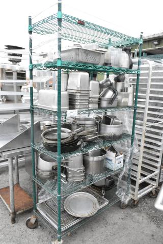 Green Finish 6 Tier Wire Shelving Unit on Commercial Casters w/ Contents Including Stainless Steel Drop In Bins, Skillets, Sauce Pans and Metal Baking Pans. BUYER MUST DISMANTLE. PCI CANNOT DISMANTLE FOR SHIPPING. PLEASE CONSIDER FREIGHT CHARGES.