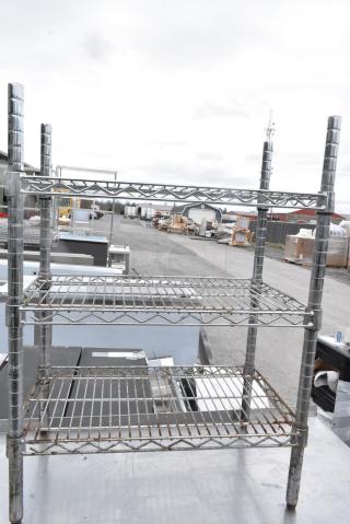 Chrome Finish 3 Tier Wire Shelving Unit. BUYER MUST DISMANTLE. PCI CANNOT DISMANTLE FOR SHIPPING. PLEASE CONSIDER FREIGHT CHARGES.