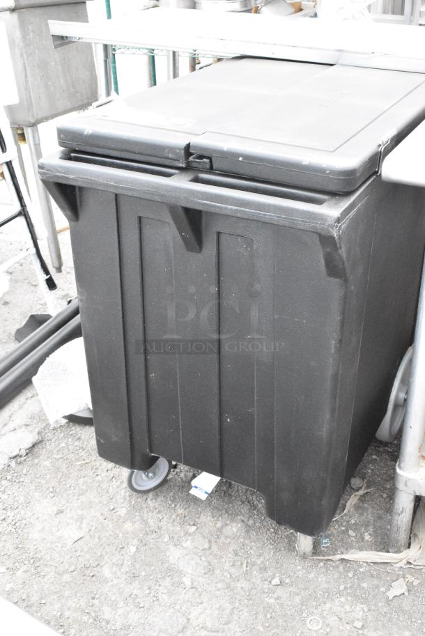 BRAND NEW SCRATCH AND DENT! Carlisle Black Poly Portable Ice Bin on Casters. - Image 1 of 6
