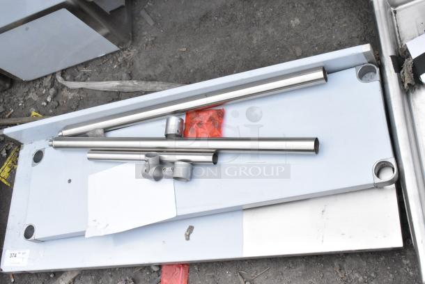 BRAND NEW SCRATCH AND DENT! Regency 600TB1848G 18" x 48" 18-Gauge 304 Stainless Steel Commercial Work Table with 4" Backsplash and Galvanized Undershelf - Image 3 of 5