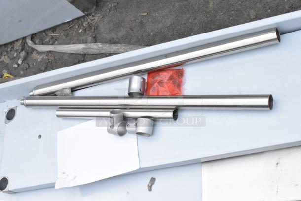 BRAND NEW SCRATCH AND DENT! Regency 600TB1848G 18" x 48" 18-Gauge 304 Stainless Steel Commercial Work Table with 4" Backsplash and Galvanized Undershelf - Image 4 of 5