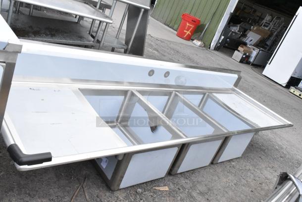 BRAND NEW SCRATCH AND DENT! Regency 600S32028224 115" 16-Gauge Stainless Steel Three Compartment Commercial Sink with 2 Drainboards - 20" x 28" x 14" Bowls. No Legs - Image 1 of 8