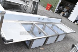 BRAND NEW SCRATCH AND DENT! Regency 600S32028224 115" 16-Gauge Stainless Steel Three Compartment Commercial Sink with 2 Drainboards - 20" x 28" x 14" Bowls. No Legs