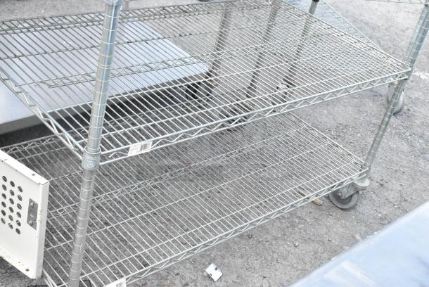 Chrome Finish 6 Tier Wire Shelving Unit on Commercial Casters. BUYER MUST DISMANTLE. PCI CANNOT DISMANTLE FOR SHIPPING. PLEASE CONSIDER FREIGHT CHARGES. - Image 4 of 6