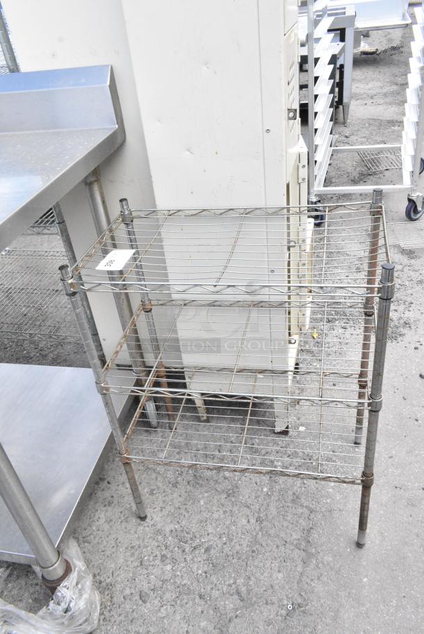 Chrome Finish 3 Tier Wire Shelving Unit. BUYER MUST DISMANTLE. PCI CANNOT DISMANTLE FOR SHIPPING. PLEASE CONSIDER FREIGHT CHARGES. - Image 1 of 5