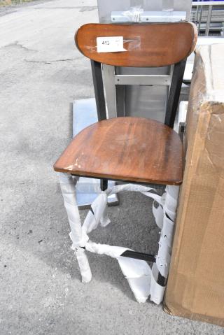 BRAND NEW SCRATCH AND DENT! Black Metal Bar Height Chair w/ Wooden Back Rest and Seat.