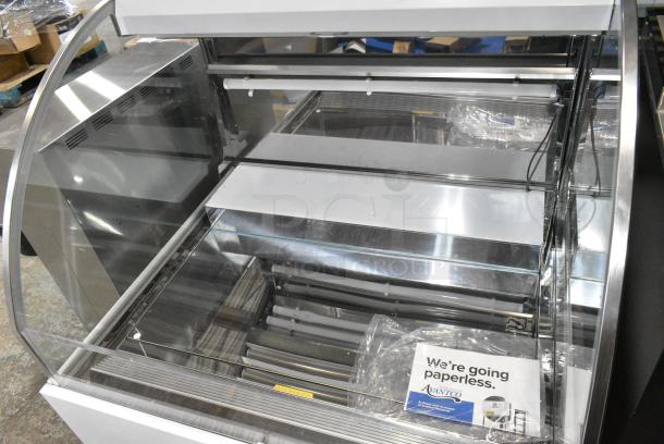 BRAND NEW SCRATCH AND DENT! 2024 Avantco 193HAC36W 36" White Horizontal Air Curtain Merchandiser with 1 Shelf and LED Lighting on Commercial Casters. 115 Volts, 1 Phase. Tested and Working! - Image 5 of 7