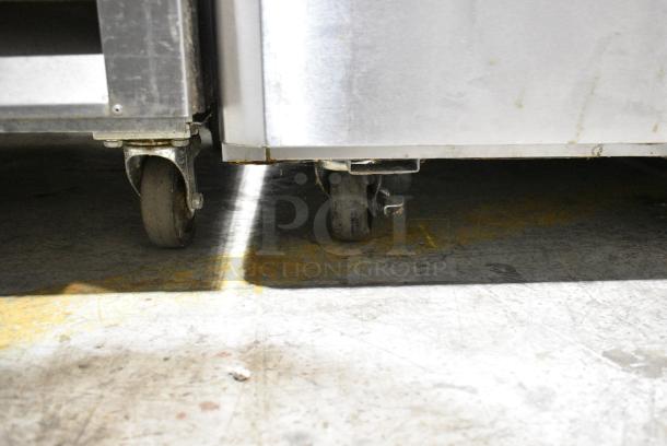 Turbo Air M3RF19-2-N Stainless Steel Commercial 2 Half Size Door Reach In Cooler and Freezer w/ Poly Coated Racks on Commercial Casters. 115 Volts, 1 Phase. Tested and Working! - Image 5 of 9