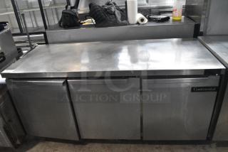 2017 Continental SW72 Stainless Steel Commercial 3 Door Work Top Cooler on Commercial Casters. 115 Volts, 1 Phase. Tested and Working!