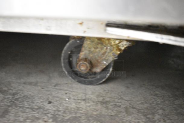 2017 Continental SW72 Stainless Steel Commercial 3 Door Work Top Cooler on Commercial Casters. 115 Volts, 1 Phase. Tested and Working! - Image 9 of 11