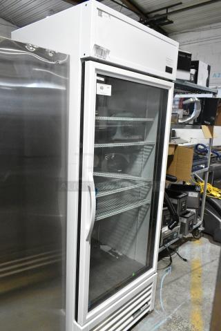 2021 True TSCI-600R-G-PH Metal Commercial Single Door Reach In Cooler Merchandiser w/ Poly Coated Racks. 115 Volts, 1 Phase. Tested and Powers On But Does Not Get Cold
