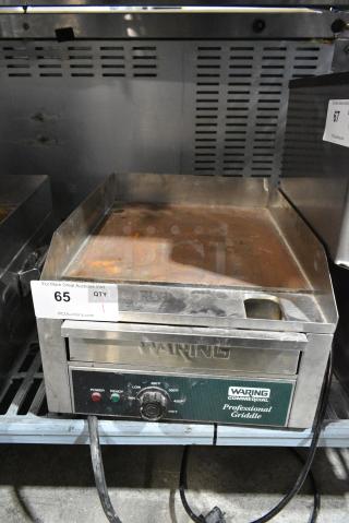 Waring WGR140X Stainless Steel Commercial Countertop Electric Powered Flat Top Griddle. 120 Volts, 1 Phase.