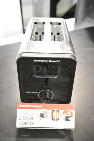 Hamilton Beach T143 Metal Countertop 2 Slot Toaster. 120 Volts, 1 Phase. Unit Was a Store Display.