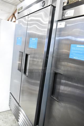 True T-35 Stainless Steel Commercial 2 Door Reach In Cooler w/ Poly Coated Racks on Commercial Casters. 115 Volts, 1 Phase. Tested and Working!