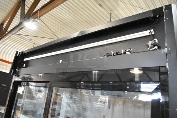 BRAND NEW SCRATCH AND DENT! 2024 Avantco 178GDS47HCB Metal Commercial 2 Door Reach In Cooler Merchandiser on Commercial Casters. 115 Volts, 1 Phase. Tested and Working! - Image 4 of 12