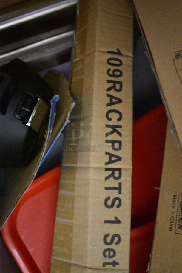 18 BRAND NEW SCRATCH AND DENT! Boxes Including Jubilee Utillity Cart, Choice Full Size Stainless Steel Solid Steam Table / Hotel Pan Cover,407BUNFULL Choice Full Size 18" x 26" 19 Gauge Wire in Rim Aluminum Bun Pan / Sheet Pan, 3 600IB1824LID Regency Stainless Steel Sliding Lid for 18" x 24" Underbar Ice Bin, 600FD48G Regency Deck-Mounted Faucet with 4" Centers and 8" Swivel Gooseneck Spout, 109RACKPARTS Regency Crossbar and Hardware Kit for 20 Pan End Load Bun / Sheet Pan Rack, 3 164TCOLROD25 Lancaster Table & Seating 25 3/16" Standard Height Table Base Column and Rod, 522CS12424 Steelton 29 1/2" 18-Gauge Stainless Steel One Compartment Commercial Sink without Drainboard - 24" x 24" x 12" Bowl. 18 Times Your Bid! May Be Missing Pieces - Image 9 of 14