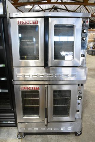 2 Blodgett Stainless Steel Commercial Natural Gas Powered Full Size Convection Oven w/ View Through Doors, Metal Oven Racks and Thermostatic Controls on Commercial Casters. 2 Times Your Bid!