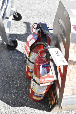 2 Fire Extinguishers. 2 Times Your Bid! Buyer Must Pick Up - We Will Not Ship This Item.
