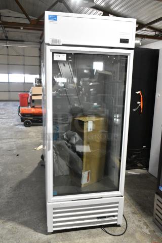 2020 True TSCI-600R-G-PH Metal Commercial Single Door Reach In Cooler Merchandiser w/ Poly Coated Racks. 115 Volts, 1 Phase. Tested and Powers On But Does Not Get Cold