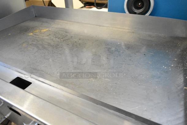 BRAND NEW SCRATCH AND DENT! Vulcan MSA48-102 Stainless Steel Commercial Countertop Natural Gas Powered Flat Top Griddle w/ Thermostatic Controls. 108,000 BTU. - Image 4 of 8