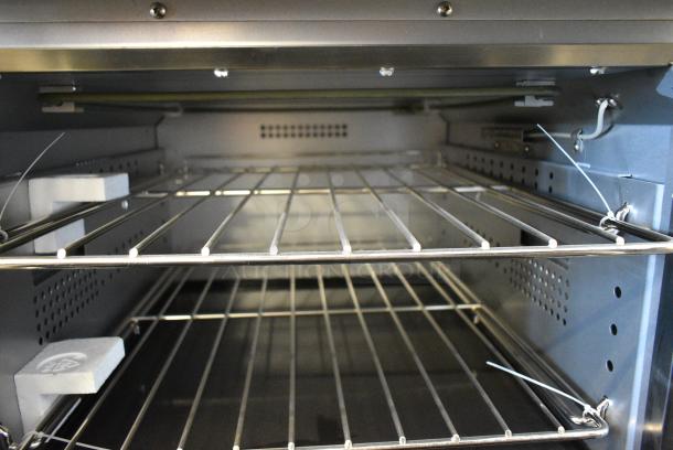 BRAND NEW SCRATCH AND DENT! Cooking Performance Group CPG 351ER24SC Stainless STeel 24" 4-Burner Electric Range with Space Saver Oven. 208 Volts, 3 Phase. - Image 12 of 14