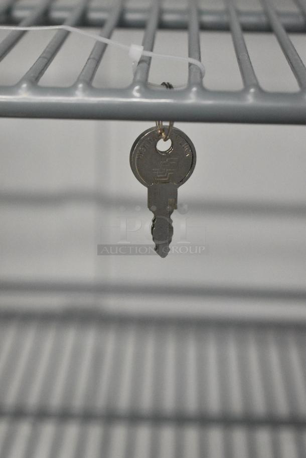 BRAND NEW SCRATCH AND DENT! 2024 Avantco 178A19FHC Stainless Steel Commercial Single Door Reach In Freezer. 115 Volts, 1 Phase. Tested and Powers On But Does Not Get Cold - Image 4 of 6