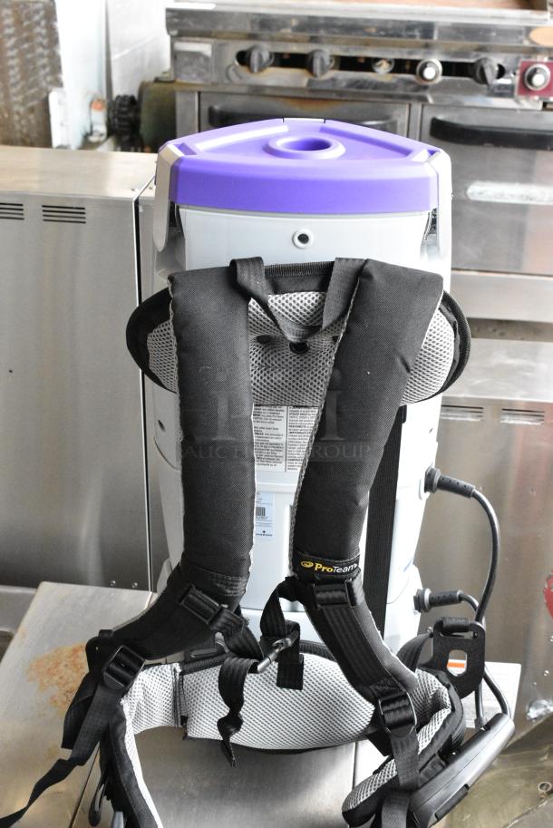 BRAND NEW SCRATCH AND DENT! ProTeam 107644 GoFree Flex Pro II 12 Ah 6 Qt. Cordless Backpack Vacuum with Xover Multi-Surface Telescoping Wand Tool Kit 196107644. Tested and Working! - Image 5 of 8