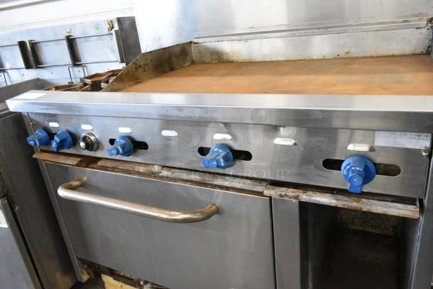 Prince Castle Stainless Steel Commercial Natural Gas Powered Flat Top Griddle w/ Left Side 2 Burner Range, Oven, Over Shelf and Back Splash. - Image 7 of 11