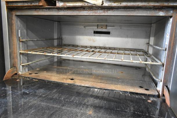 Prince Castle Stainless Steel Commercial Natural Gas Powered Flat Top Griddle w/ Left Side 2 Burner Range, Oven, Over Shelf and Back Splash. - Image 10 of 11